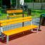 Ghế Ryga Bench w/ Backrest màu vàng tươi với tựa lưng, thiết kế chắc chắn cho khu vui chơi ngoài trờ