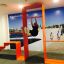 Thiết bị tập thể dục ngoài trời Ribbon Fitness II màu cam với thanh xà đơn cho bài tập xà đơn.