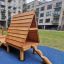 Kanha wooden playhouse with slide bằng gỗ tự nhiên cho khu vui chơi trẻ em.