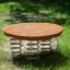 Wooden Balance Board với mặt gỗ tròn và lò xo đàn hồi cho sân chơi trẻ em.