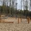 Obstacle Course Mini Climbing Net với cấu trúc gỗ và lưới leo núi cho khu vui chơi ngoài trời.