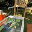 Bàn HPL Bench Chess and ludo game ngoài trời với bàn cờ và trò chơi ludo nhiều màu sắc.