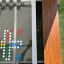 Bàn chơi HPL Bench Chess and ludo game với bề mặt kính trong suốt và ghế gỗ màu nâu.