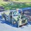 Jungle car bằng gỗ màu xanh dành cho trẻ em chơi ở sân chơi ngoài trời.