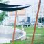 Cấu trúc gỗ với Sun Shades tạo bóng mát cho khu vui chơi ngoài trời.